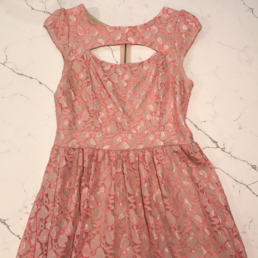 Nude dress with hot pink flower outline